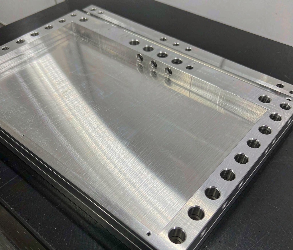 Custom Metal Plates: Cutting, Tolerances and Finishing Guide - Huaxiao precision manufacturing