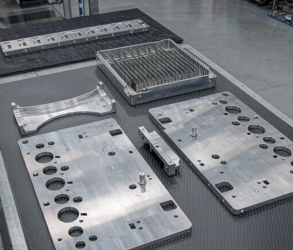 EV Battery Metal Parts: End Plates, Trays, Busbars and Cold Plates - Huaxiao precision manufacturing