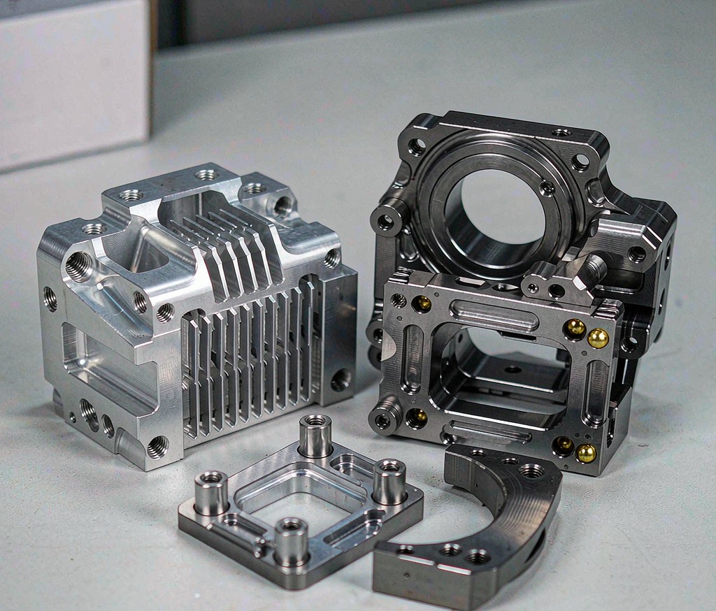 Electric Vehicle Metal Parts: Chassis, Structural & Thermal Components Buyer's Guide - Huaxiao precision manufacturing